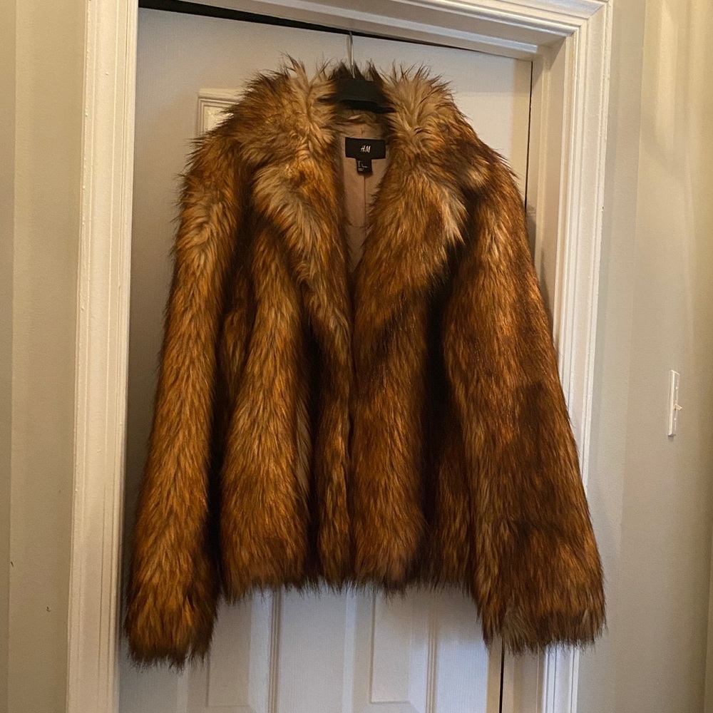 Beautiful Faux Fur short coat.